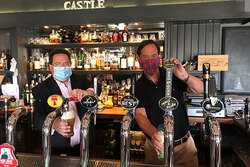 Craig Hoy MSP (left) pulling pints at the Castle Inn, Dirleton, with North Berwick Coastal Councillor Jeremy Findlay (right).