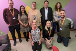 •	[Left-to-right; from back row]: Stevie Baxter (Independent Living Support Worker); Nicola Melvin (Groups Support Worker); Mhairi Kiernan (Employability Support Worker); Craig Hoy MSP; Lynne Anderson (Education and Employability Coordinator); Emma Scarcliffe (CEO); Natasha McInninie (Practice Manager); and Grant Hamilton (Personal Development Worker)