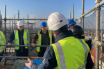 Craig and Cllr Lachlan Bruce chatting on scaffold