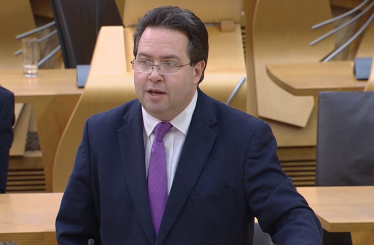 Craig Hoy MSP speaking to MSPs in Scottish Parliament