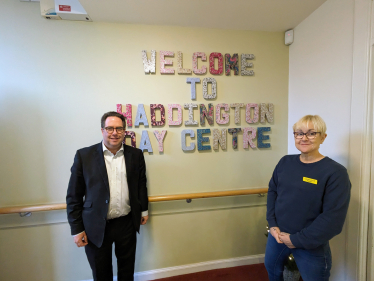 Craig hoy MSP at the welcoming sign of Day Centre