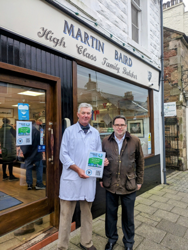  Martin Baird (left) with Craig Hoy MSP (right) outside of Martin Baird Butchers